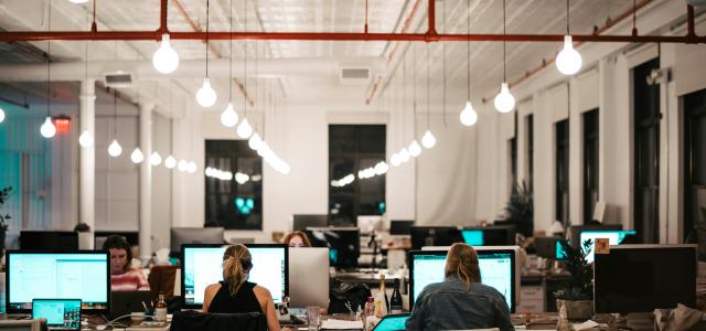 people sitting on chair in front of computer by Israel Andrade courtesy of Unsplash.