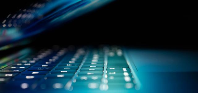 closeup photo of turned-on blue and white laptop computer by Philipp Katzenberger courtesy of Unsplash.